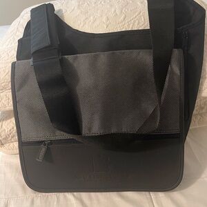 New Line Cinema Black and Gray Men's Messenger Bag by Leed’s.